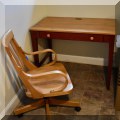 F58. Ethan Allen desk and matching chair. 30.5&rdquo;h x 40&rdquo;w x 24&rdquo;d 